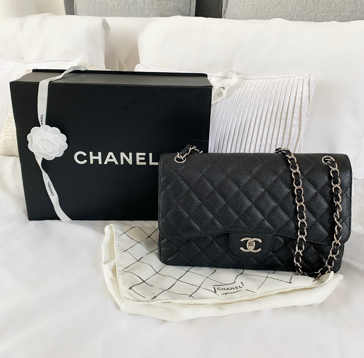 Chanel Jumbo classic flap bag black caviar with silver hardware